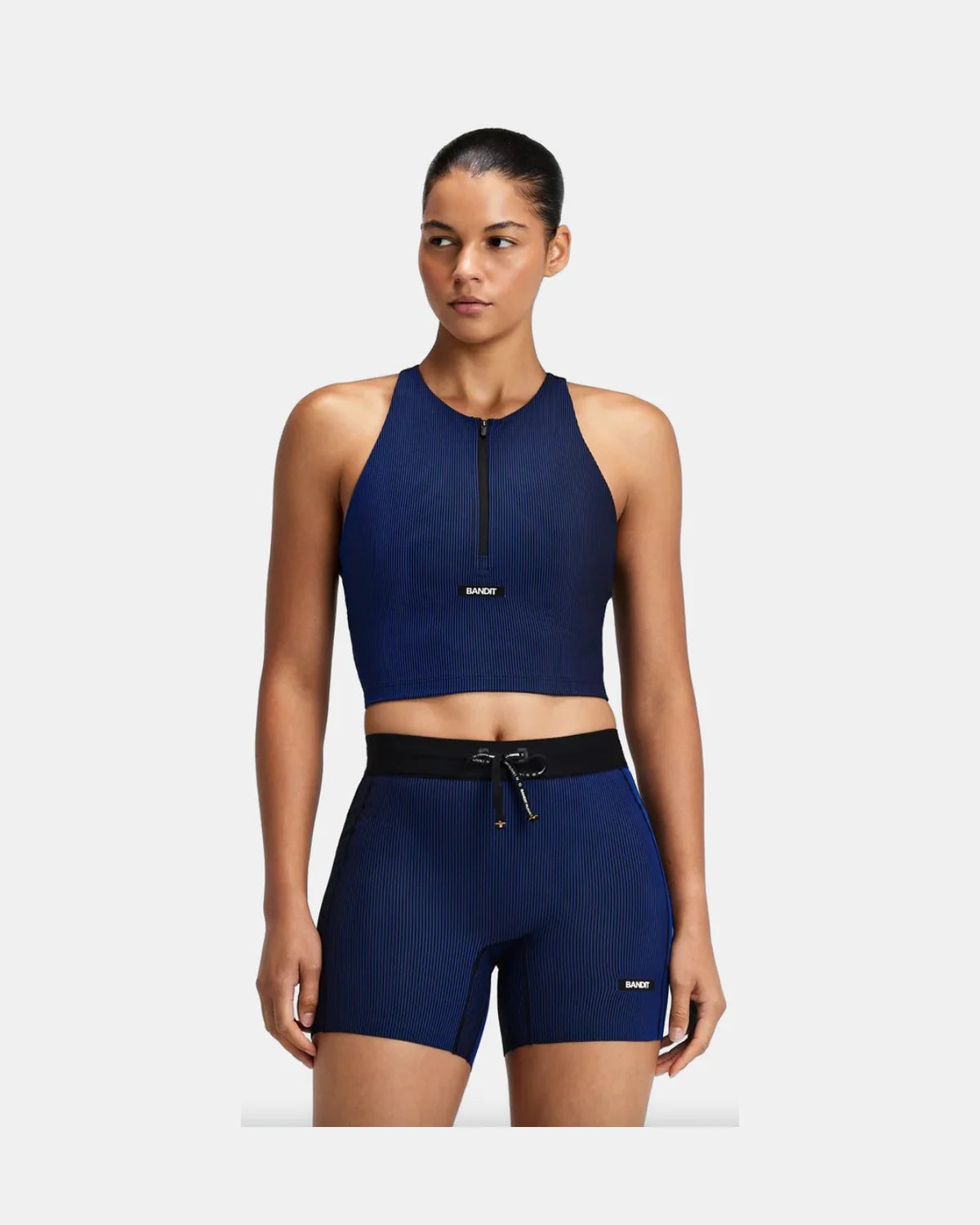 WOMEN STRIPED CADENCE ZIP FRONT T-BACK RACE CROP - BLACK / BAUHAUS BLUE
